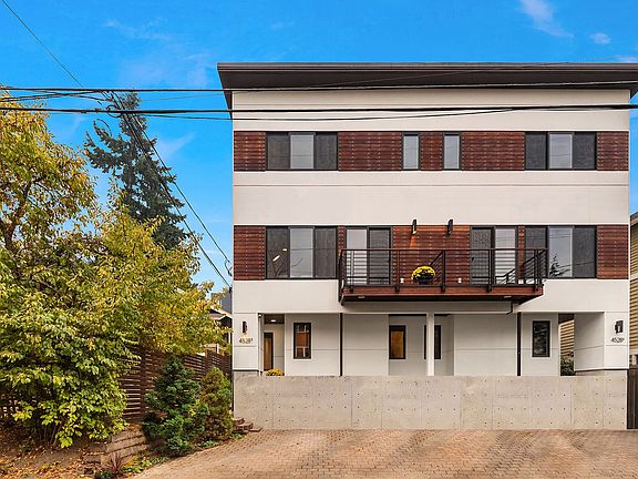 Welcome home to this like-new, 2014 Built Green 4-star certified modern townhome (incl. no-VOC paint, no carpets, high-efficiency heating, water on-demand, additional insulation, etc.). Other exterior features include Hardie fiber cement siding with natural Brazilian Walnut accents, Milgard windows, metal roof and a designated off-street parking spot with conduit for EV charger.