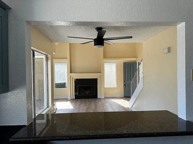 Looking at living room from kitchen opening