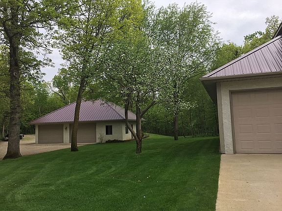 Between house and garage. 