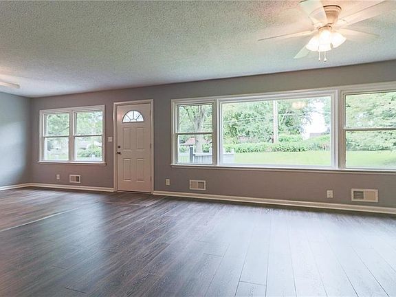 Great Room w Lots of Windows and New Flooring!