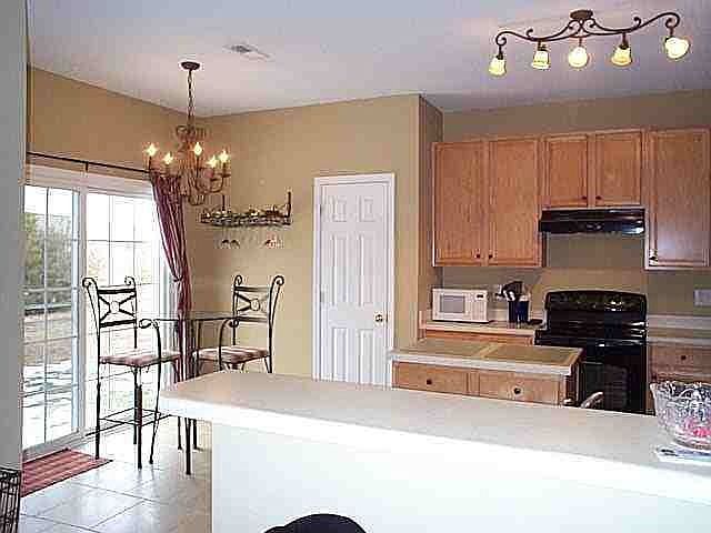 Kitchen with Center Island and Breakfast Bar