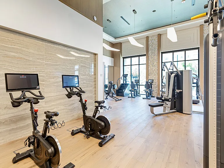 24-hour Technogym Fitness Center with Echelon Spin Bikes & Reflect Mirror, TRX and Rower