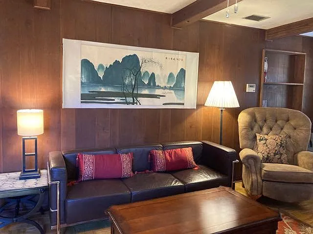 Living room with leather couch, lazy boy