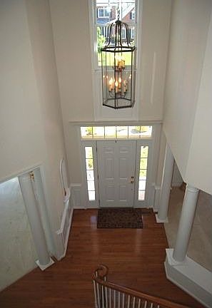 Dramatic two story entry foyer.