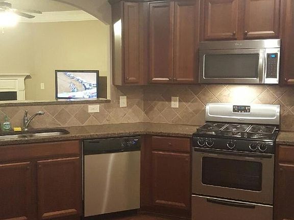 Kitchen all stainless steel appliances. 