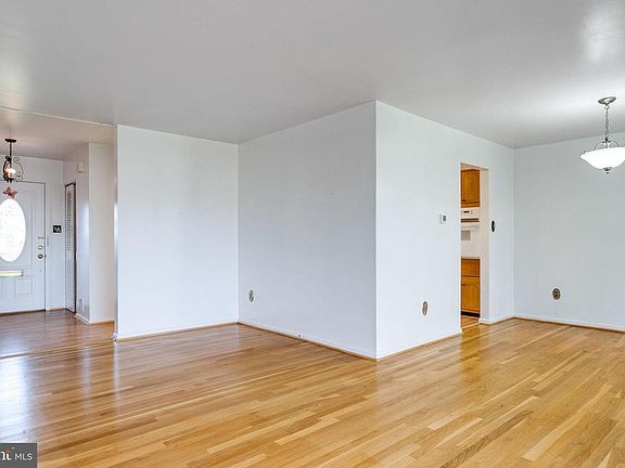 Living Room to Dining Room opens to Kitchen