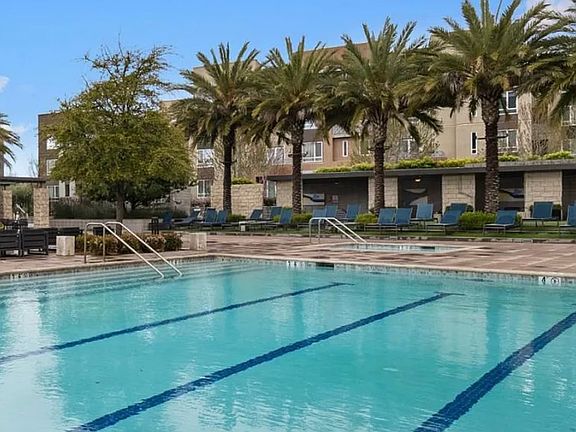 Clubhouse + Junior Olympic pool (cabanas, BBQs, fire pits). Community lounge, private cabanas and outdoor gaming areas