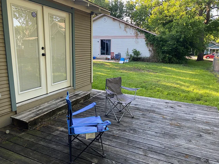 Large wooden deck off the kitchen.