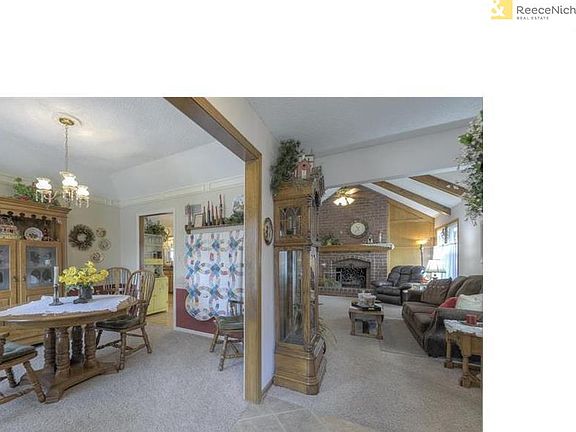 Taken from front door/entryway.  Looking to family room on right and dining room to the left.