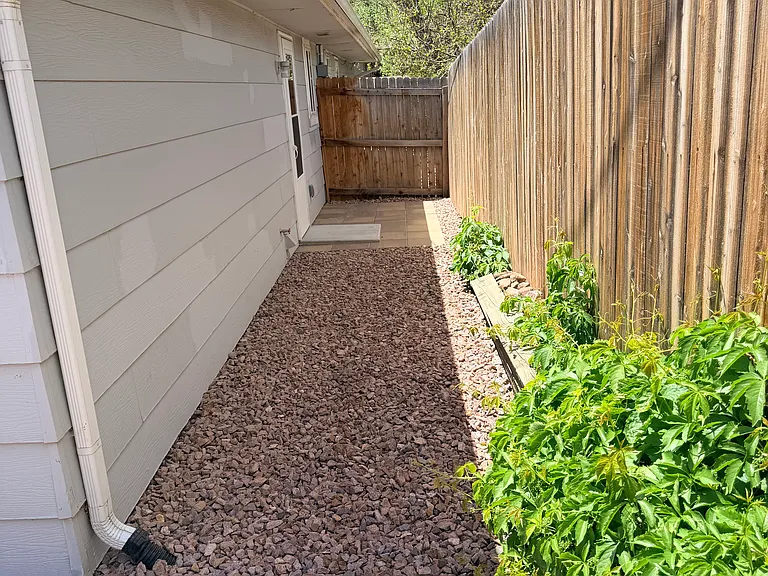 West side of building/yard