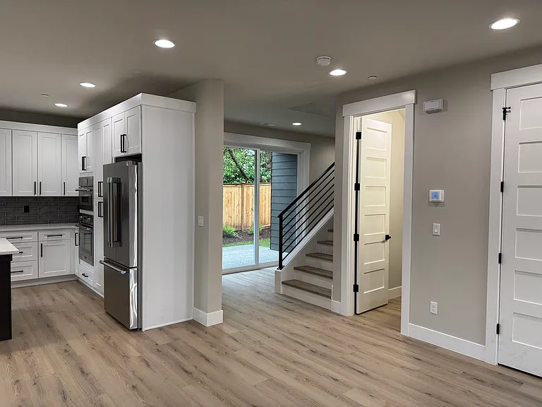 View of power bath, stairs & back covered patio.