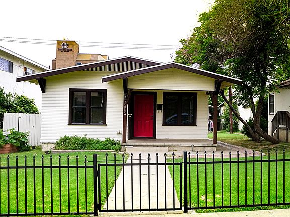 Gated Front Lawn w/Herb Garden