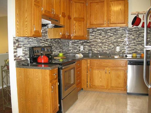 GLASS TIELL BACK SPLASH NEW COUNTER TOPS