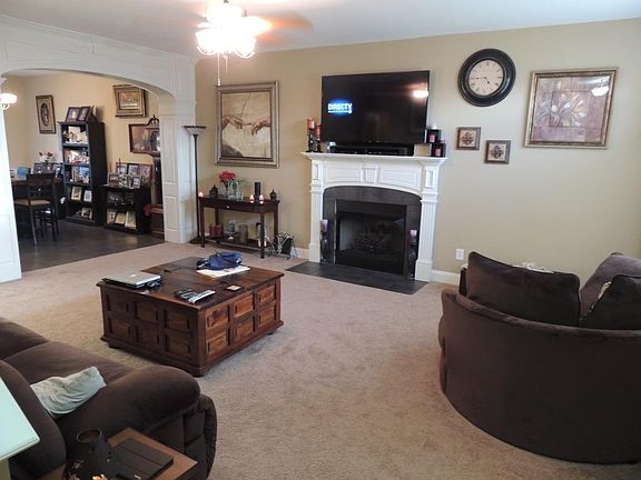spacious living room with propane fireplace