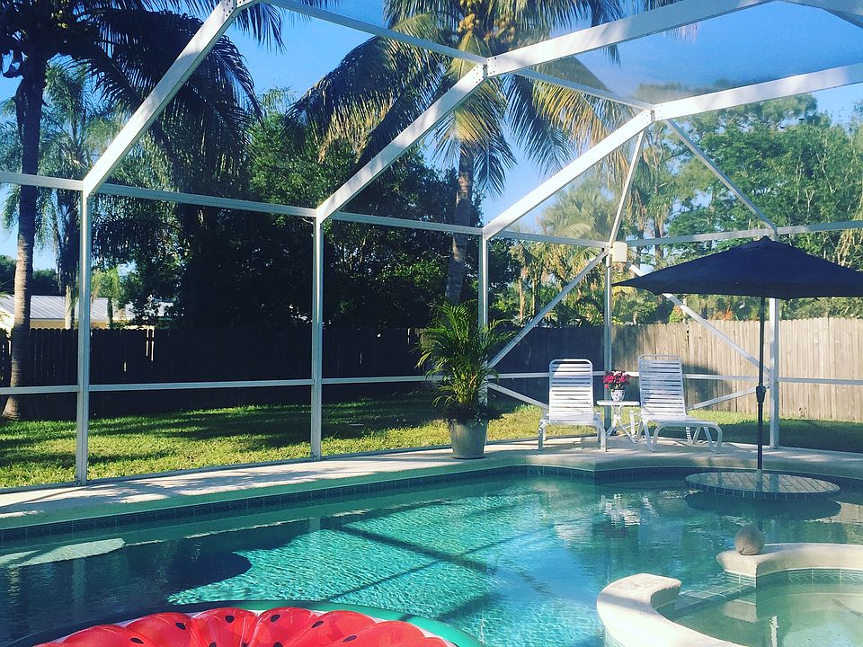 Screened in pool area. 