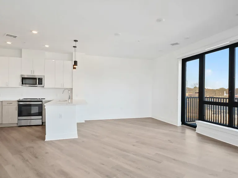 Living Room with Balcony and Hard Surface Flooring