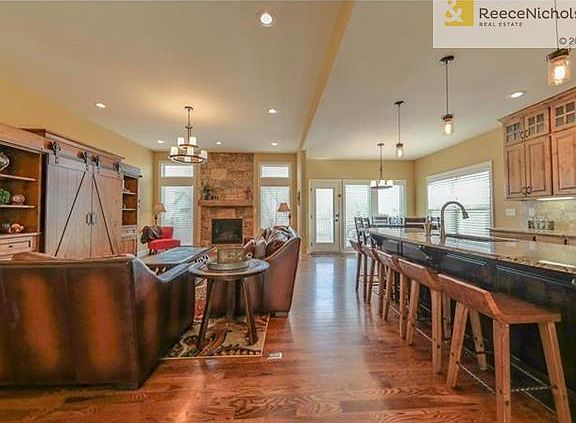 Solid Hardwood Flooring.  Vaulted Ceilings.  Open Floor Plan.  Stone Fireplace.