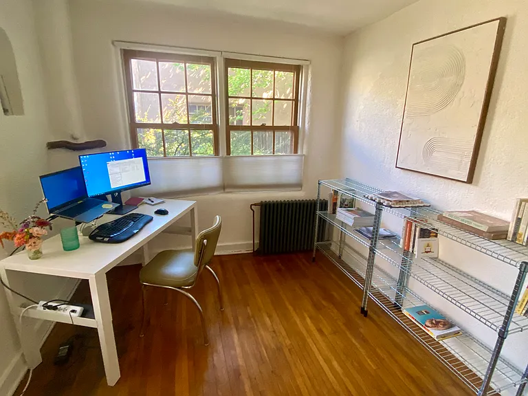 Make this flex space what you wish. It is currently furnished as an office to take advantage of watching the flowers blossom and birds visit the window while working. The natural light in this room is spectacular and translucent curtains add privacy.