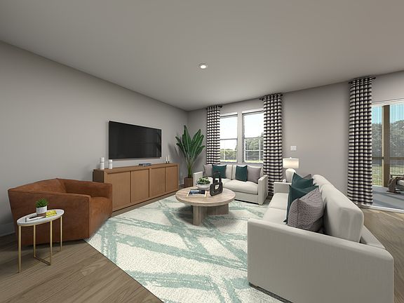 Great room in the Adams floorplan at Meritage Homes.