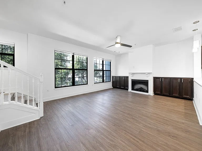 Spacious townhome living rooms that are two stories
