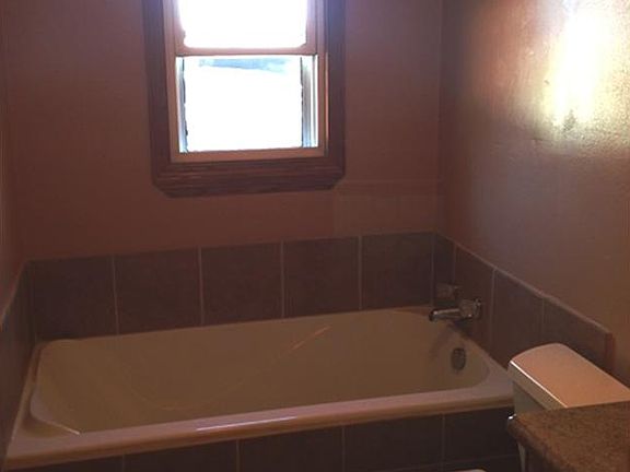 Tiled surround tub