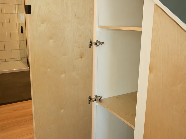 Additional storage under the stairs
