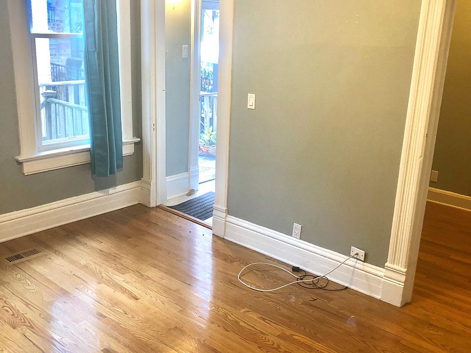 Front door into living room. Den is to the right