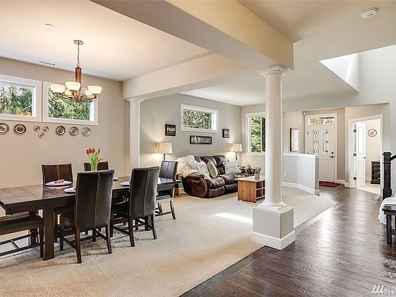 Formal dining and living rooms, main level office next to the entry