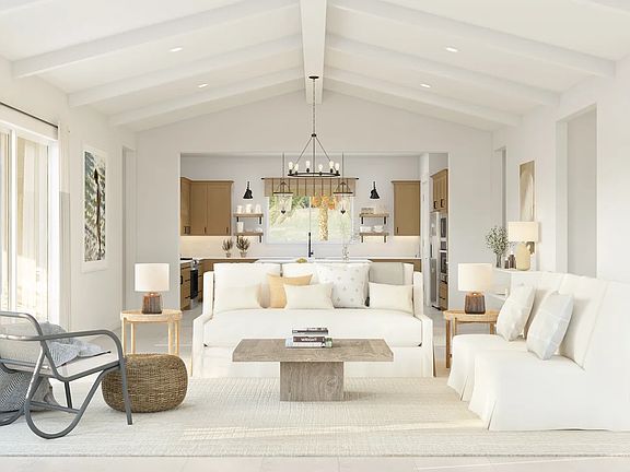 Great room with white painted ceiling beams