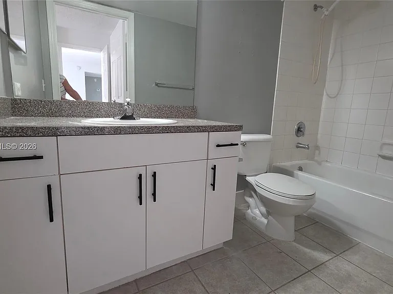5011 Wiles Rd #203 — Photo 7