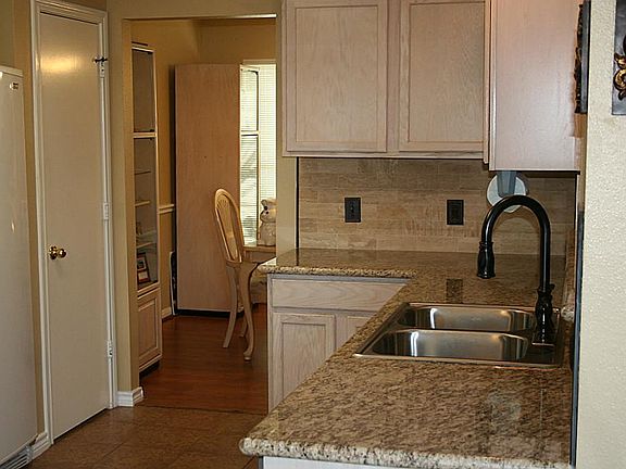 Brand New Granite Countertops & Tile Backsplash