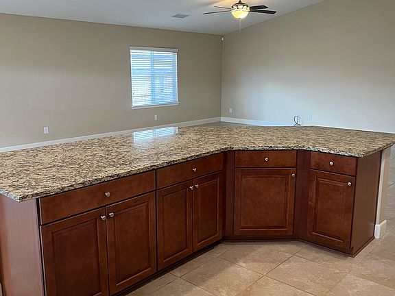 Large kitchen island overlooking great room.