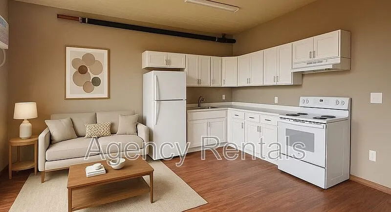 Building Photo - 1407 Pensacola St #103