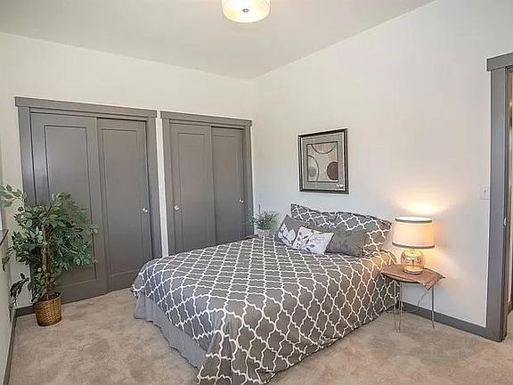 Upstairs bedroom with staging for showing.