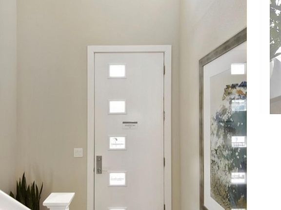 Entry with double high ceiling.