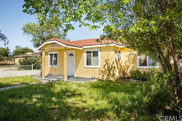 Front of the house with LARGE LOT