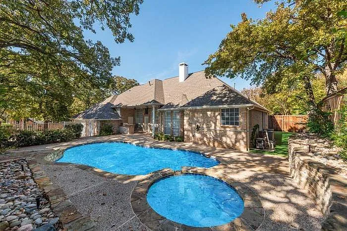 Enjoy your private backyard with covered patio, outdoor grill, mini-fridge, and sparkling pool!