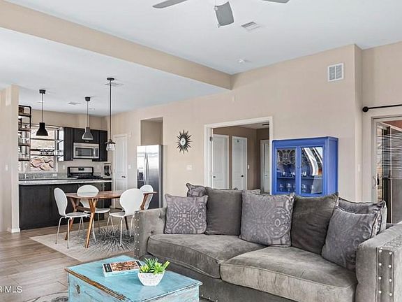 Patio access from both open living area and master bedroom.