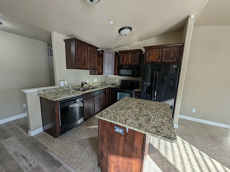 Kitchen with granite countertops