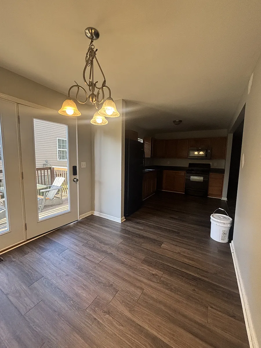 View into kitchen from dining room. - 539B Maple St