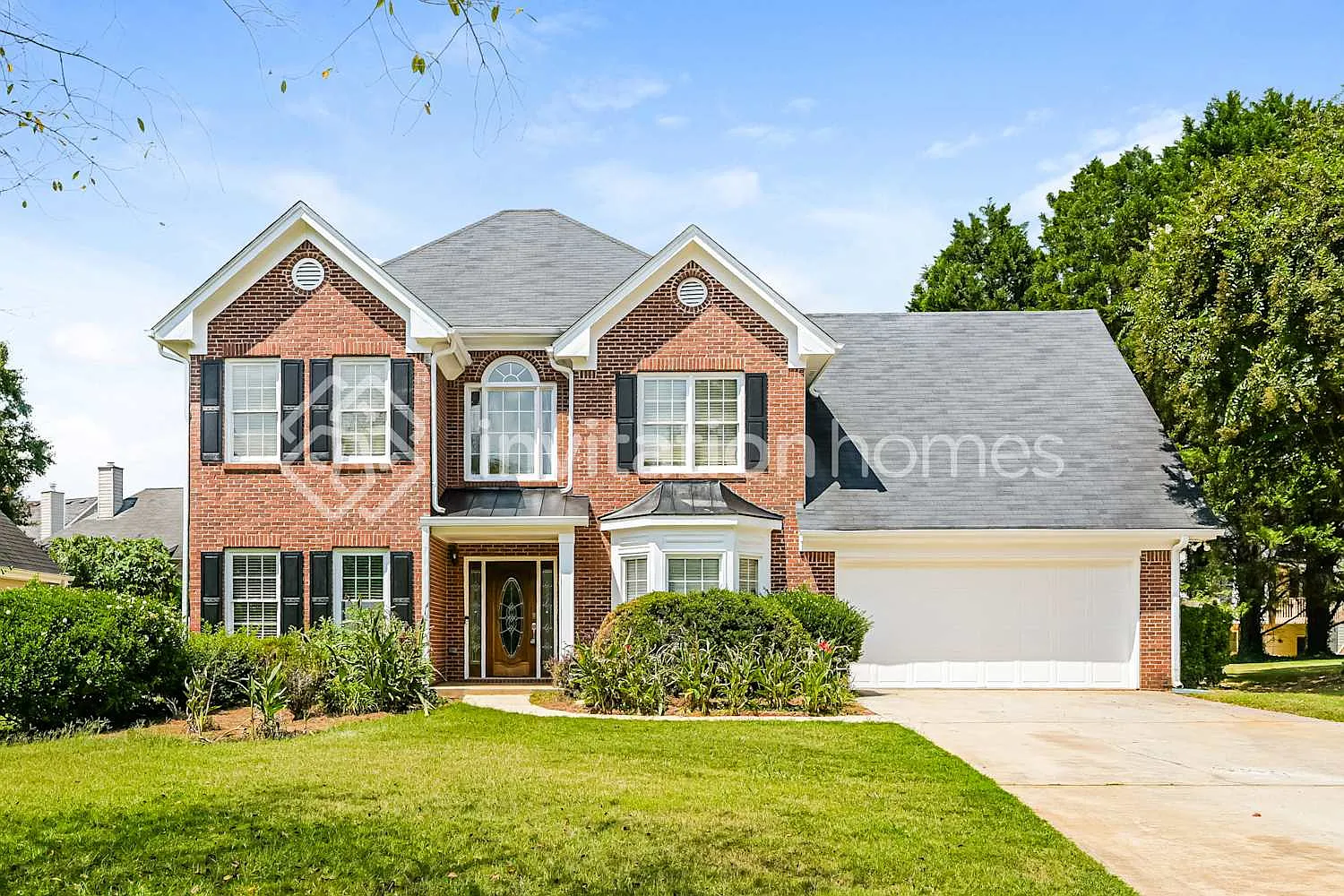 4399 Beacon Hill Dr SW Lilburn, GA 30047 — Photo 1