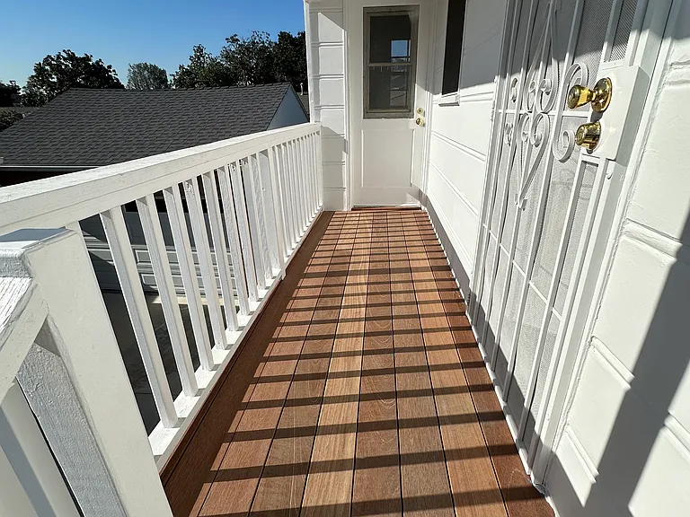 Teak deck covered landing.
