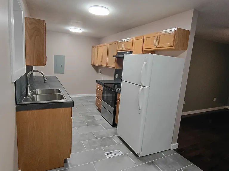 kitchen has brand new stove dishwasher and lots of countertop space. washer and dryer hook ups