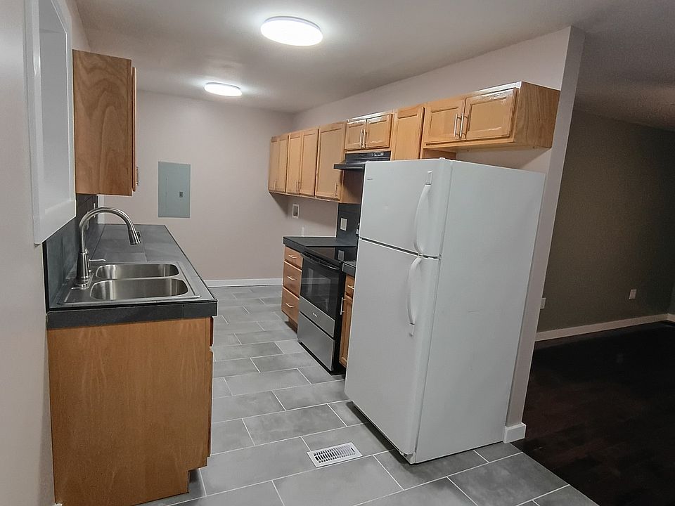 kitchen has brand new stove dishwasher and lots of countertop space. washer and dryer hook ups