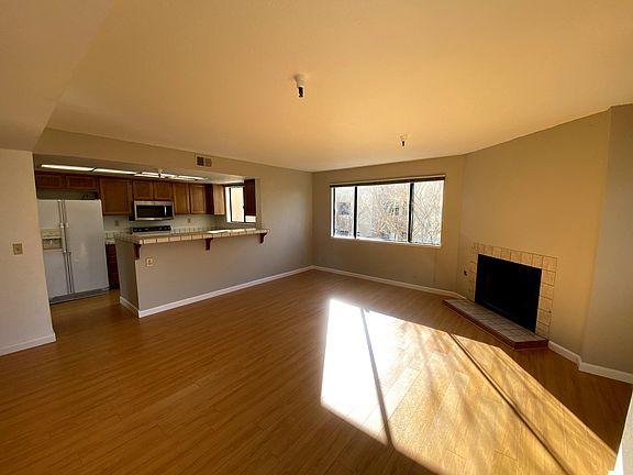 Kitchen & Living Room w Fireplace