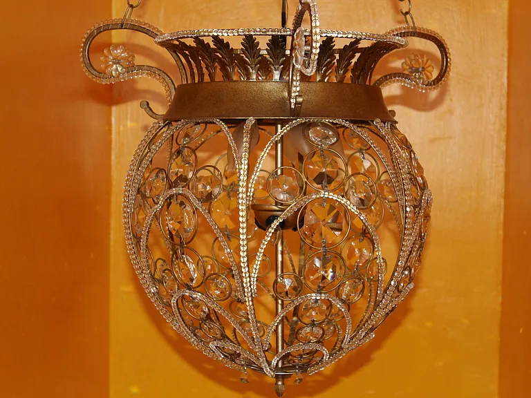 Chandelier above stairs