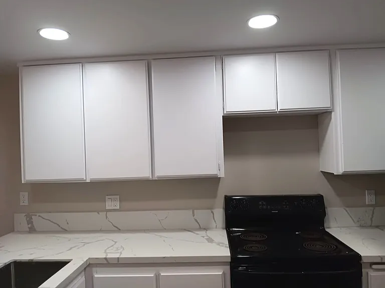 White cabinets reflect brilliant LED light.