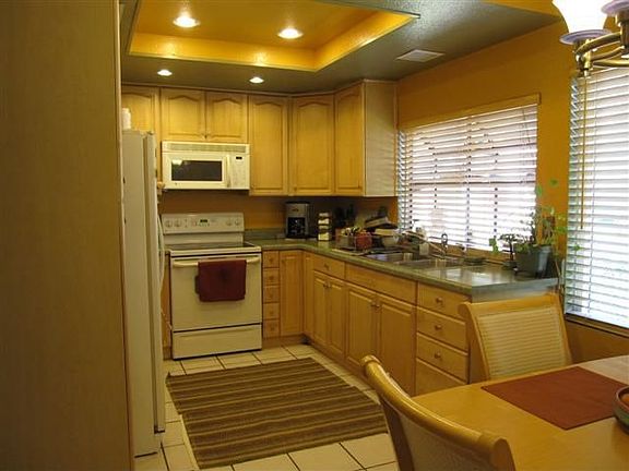 Remodeled Kitchen w/ newer cabinetry, counters, appliances, recessed lights