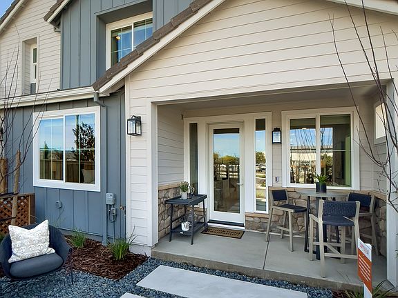 A secluded outdoor retreat, this private patio offers a perfect blend of comfort and tranquility.