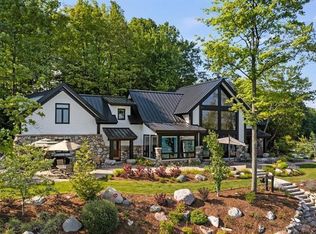 3615 N West Torch Lake Dr, Kewadin, MI 49648